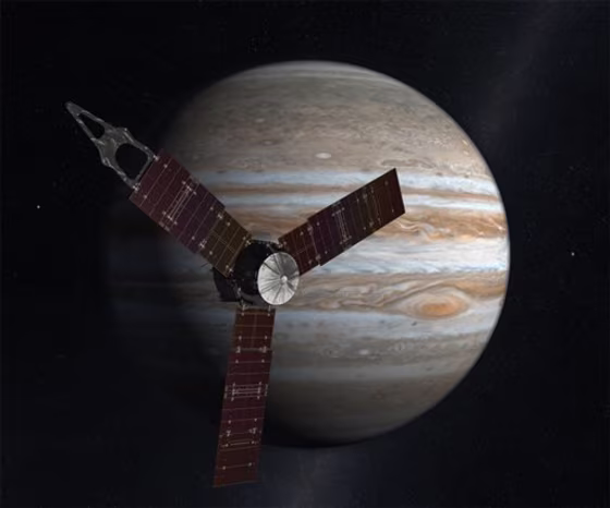 This artist's rendering shows the Juno spacecraft circling Jupiter. On Thursday, the spacecraft executed the first of two engine burns aimed at setting itself up for an Earth gravity assist next year. It's due to arrive at Jupiter in 2016.